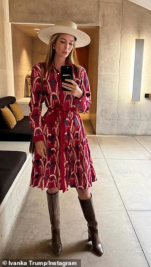 She also shared a mirror selfie taken at the luxury resort, showing off her style in a stunning crimson midi dress paired with a white straw hat.