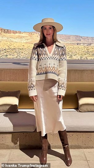 For her fourth outfit, she kept the same western hat and boots, but this time she paired them with a cream-colored sweater and a matching satin dress.