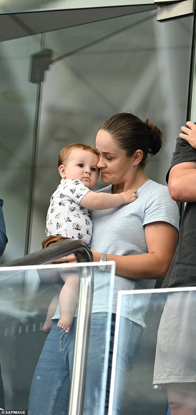Ash seemed delighted to be fulfilling her mummy duties and was seen lovingly cuddling with her beautiful boy throughout the match.