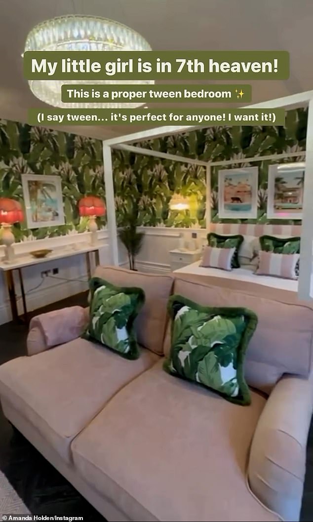 The TV star especially loves her daughter Hollie's bedroom, which is wallpapered in a jungle green print and includes a four-poster bed decorated with white and powder pink striped pillows.