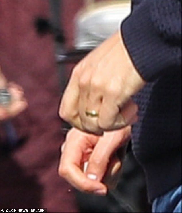 Andrew's wedding ring could be seen in the shots after it was revealed earlier this month that Amy had taken him back.