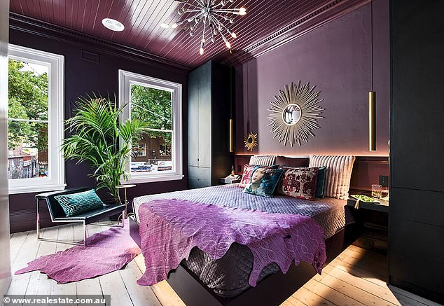 Retaining its old 'Victorian' street façade, the renovation integrated the house's classic architectural features into a new design to create an ultra-modern home.  (In the photo, one of the three extraordinary bedrooms)