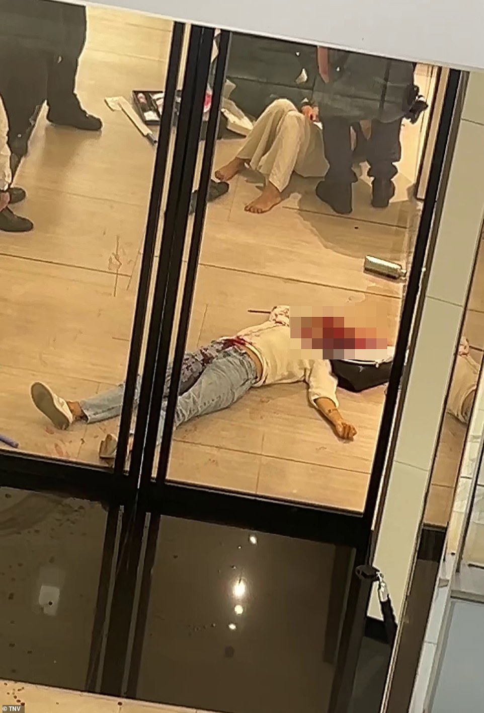 The victims of the attack were left lying in the shopping center as police worked to stop the attack.
