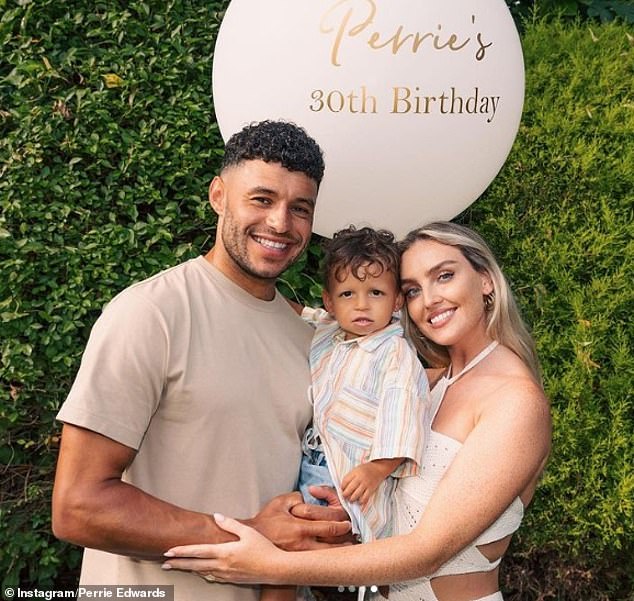 Perrie confessed that Axel isn't that big a fan of her ballads and prefers upbeat songs (pictured with her fiancé and Axel's father, Alex Oxlade-Chamberlain).