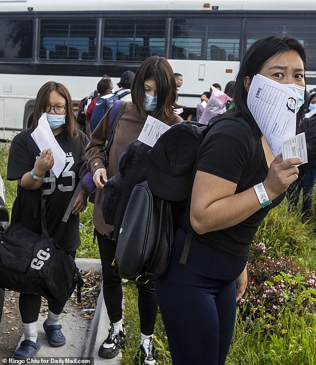 These Chinese immigrants were dropped off at a transit center near San Diego on Tuesday after they were processed and examined by federal immigration authorities.