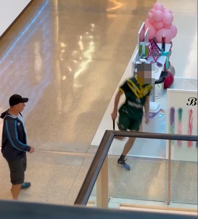 Photos and videos of the incident have been shared online showing the bearded man wearing an ARL t-shirt running through the shopping complex and allegedly cutting down innocent bystanders.