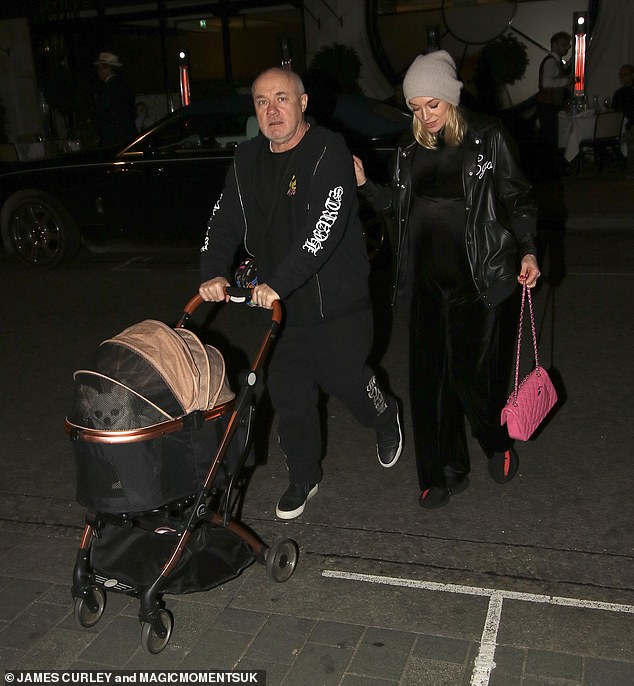 As the couple left the restaurant later that night, Damien gave Sophie his hat while keeping it casual in a black tracksuit.