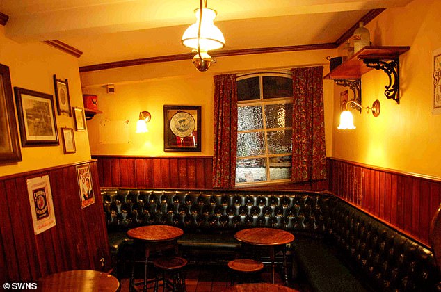The popular pub was famous for being the place where coins and marbles seemingly rolled uphill along the bar.
