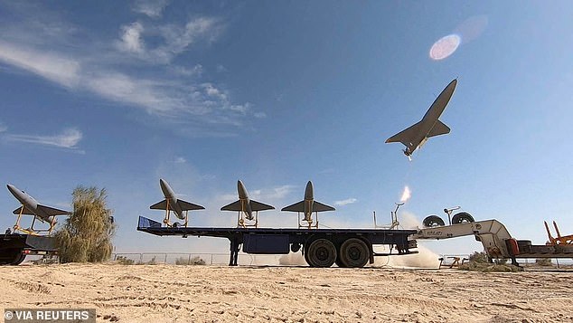 Iran launched a terrifying attack against Israel by sending some 100 drones.  Pictured: Iranian drones during a military training exercise.