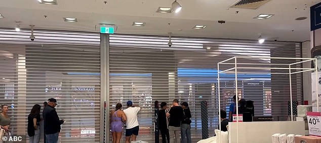 Security shutters at Myer were closed, with customers locked in to protect shoppers and staff from the attacker.  Many did not know what was happening and looked through the screens.