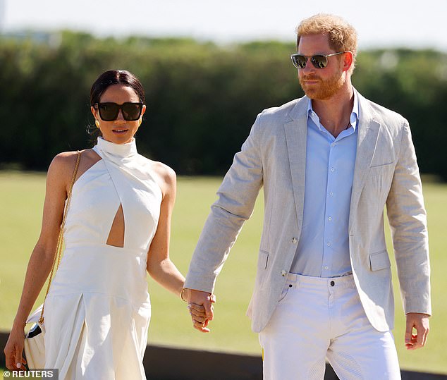 Meghan put on a stunning display when she and Prince Harry, 39, arrived hand-in-hand at the event on Friday.