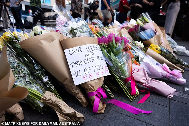 Heartfelt messages were attached to some of the bouquets left at the scene on Sunday.