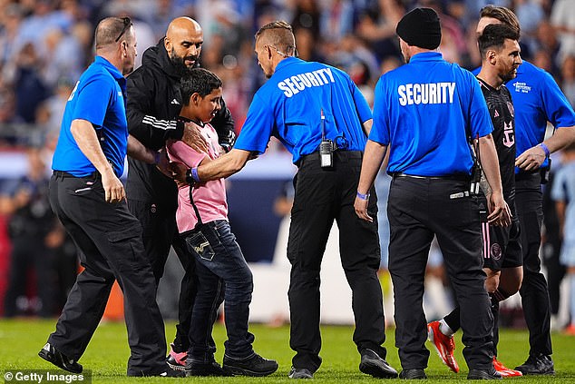 Cheuko and stadium security staff carried the boy off the field at Arrowhead Stadium.