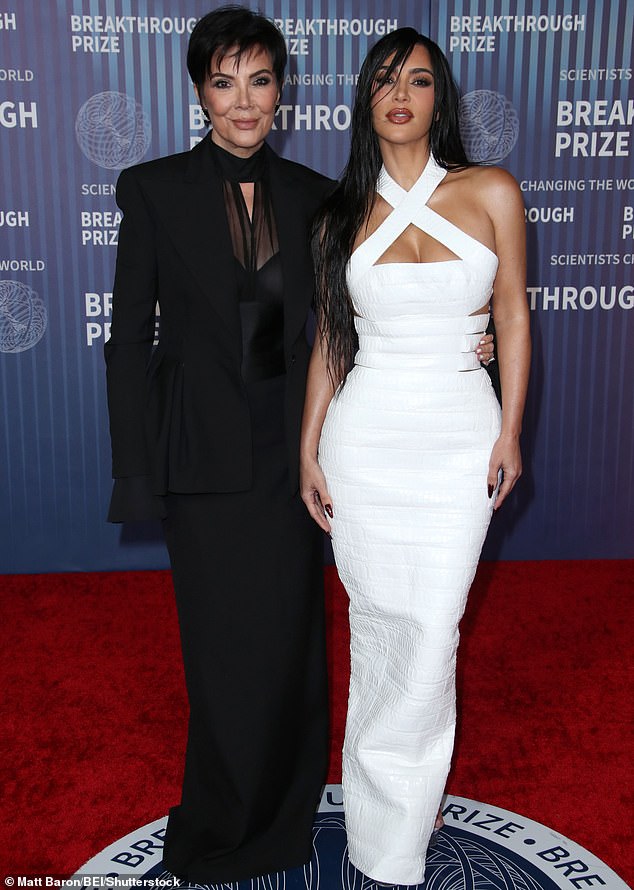 Kim Kardashian arrived on the red carpet that night arm in arm with her black-clad mother, Kris Jenner, who made the phrase 'momager' famous in her role as matriarch of the Kardashian-Jenner clan.