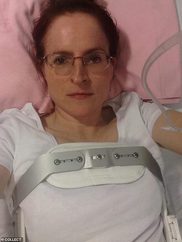 Victoria in hospital days after her skydiving accident, wearing the brace she was forced to wear for five months