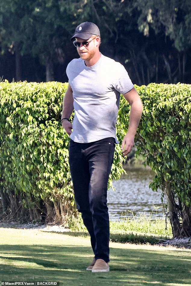 The Duke of Sussex finished off his filming outfit with a black cap with the Archewell logo