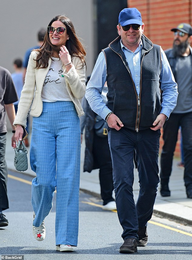 The famous chef was accompanied by personal trainer Johnson on a walk through London, four months after confirming his separation from his ex-partner Louise Davies.