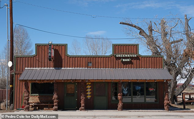 Witnesses said Roberts dragged or carried the animal through the Green River Bar while patrons watched.