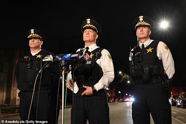 The department's deputy chief, Don Jerome (center), said Chicago police are investigating the shooting that 