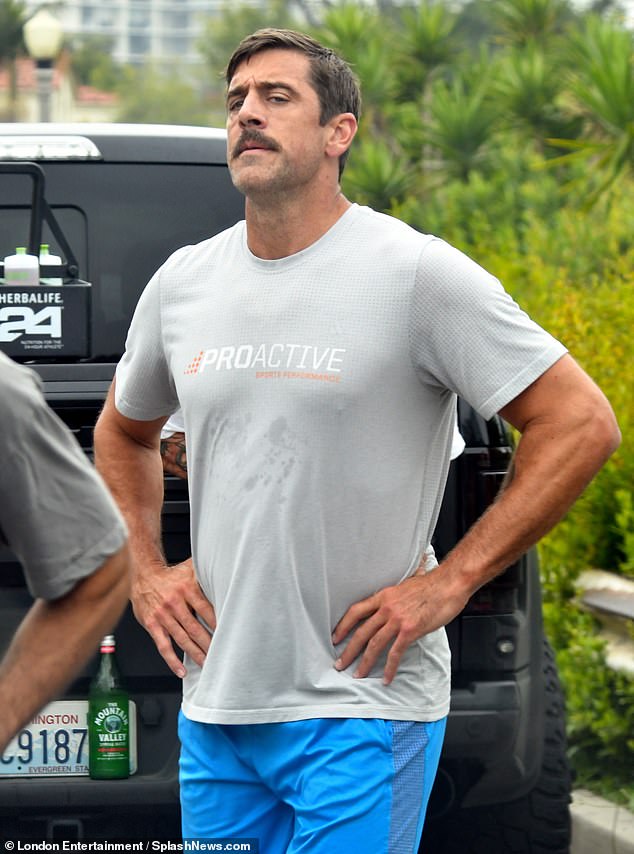 Aaron Rodgers is seen wearing a shirt from Proactive Sports Performance, where he trains.