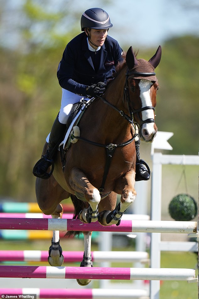 Zara looked ready for action as she elegantly maneuvered through the impressive course, dressed in her signature navy riding outfit.