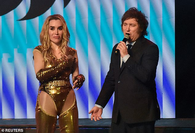 The president, 53, joined Florez, wearing a sparkly gold leotard and matching gloves, on stage after the performance of her musical 'Fátima 100%' in December.