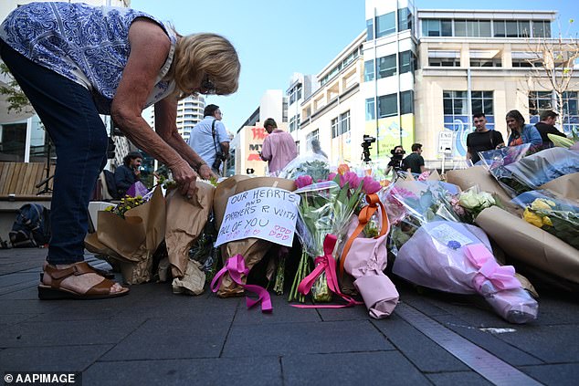 Members of the Sydney public leave memorials to the six victims of the Bondi Junction Westfield stabbing horror.