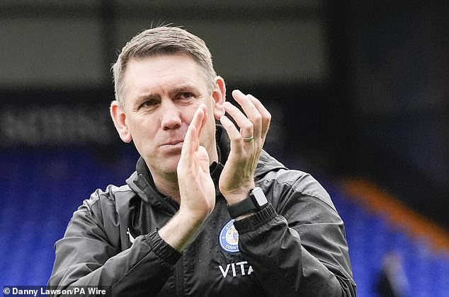 Dave Challinor sealed his seventh promotion as manager by taking Stockport to League One