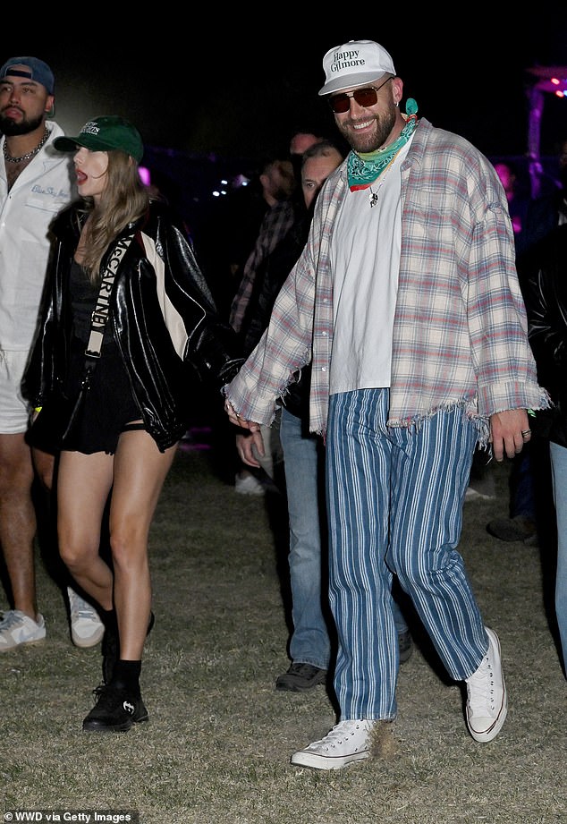 Taylor and her NFL star boyfriend were spotted putting on a display of love Saturday night as they held hands at the annual two-weekend festival.