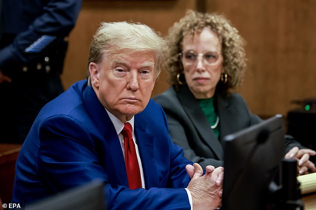 Trump (left) waits for the start of a hearing at the New York Criminal Court in New York, New York, USA, March 25, 2024
