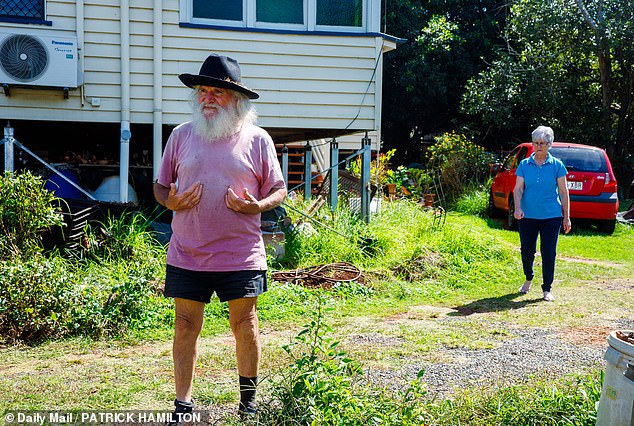 Andrew Cauchi (left) lashed out at the media on Monday before his wife (right) intervened to calm the situation.