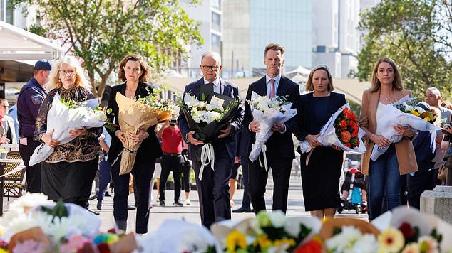 Anthony Albanese (pictured laying flowers at the mall) announced that all government buildings would lower their flags to half masks as a sign of 