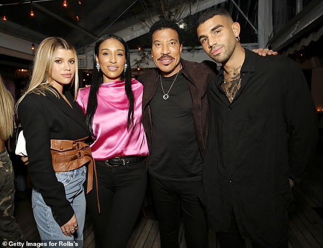 Former TOWIE star Chloe says she knew Miles was Lionel's son when they met (Lionel pictured with daughter Sofia, girlfriend Lisa Parigi and Miles in 2020)