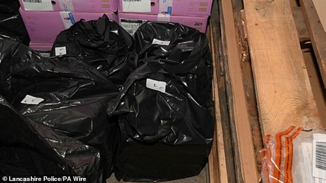 More cocaine was then found in black garbage bags in the unit.