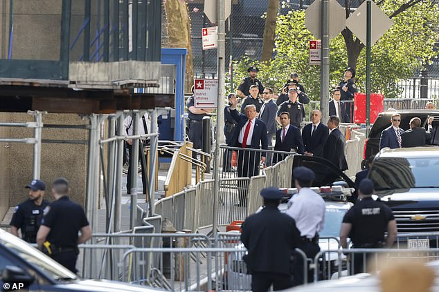 The court was surrounded by barricades and a heavy police presence when the former president entered the courtroom.
