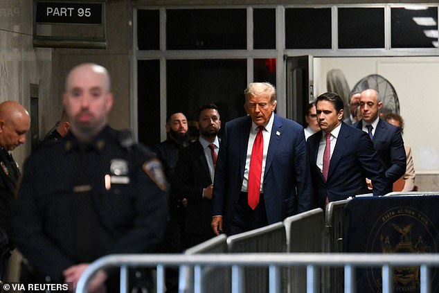 Trump arrives to attend the first day of his trial for allegedly covering up money payments linked to extramarital affairs, at Manhattan Criminal Court in New York City.