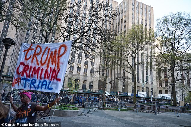 Outside the courthouse, a maze of barricades kept protesters away from Trump's criminal trial.
