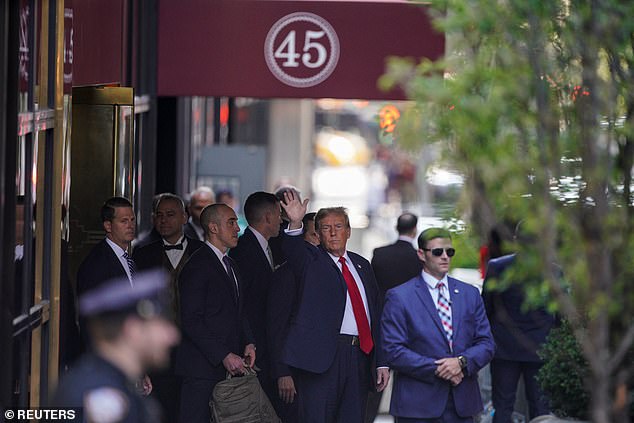 Trump waved as he left Trump Tower Monday morning toward a downtown courthouse.