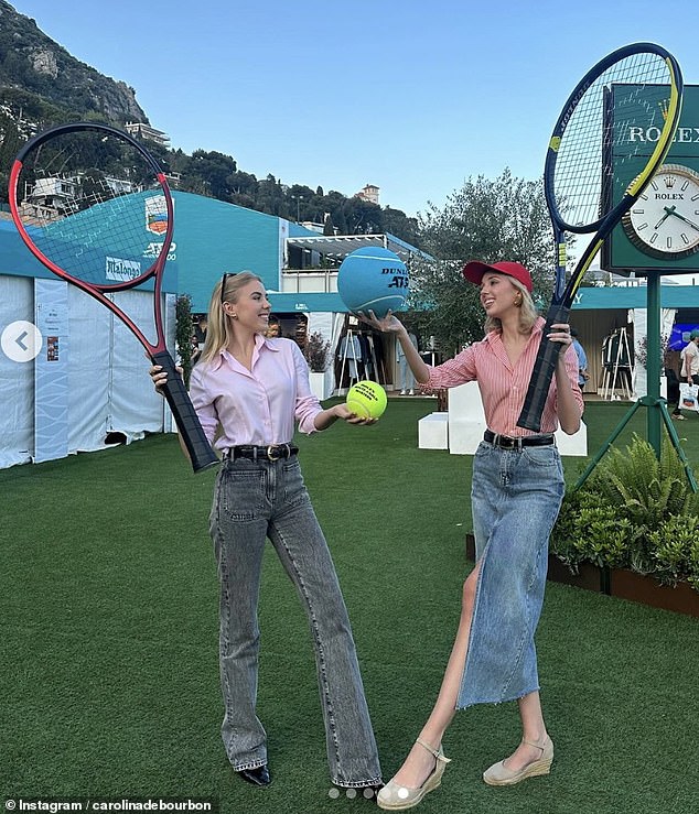 Chiara (right) opted for a red and white striped shirt that she tucked into a denim midi skirt with a thigh-high slit.