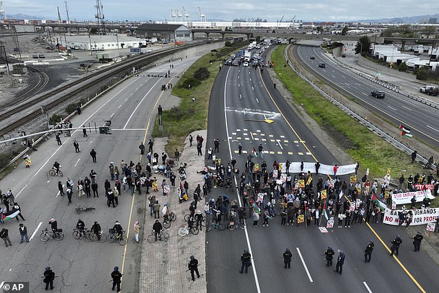 An earlier protest broke out on Highway 880 in Oakland, California, when people are seen blocking the freeway.