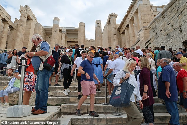 The historic site, located in Athens, usually receives around 22,000 visitors a day during the peak summer season, which inevitably leads to overcrowding (file image)