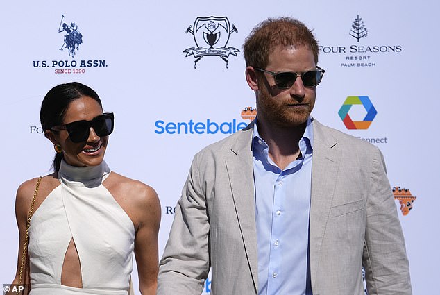 Prince Harry, right, and his wife Meghan Markle, Duchess of Sussex, arrive for the Royal Salute Polo Challenge 2024 to benefit Sentebale, April 12, 2024.