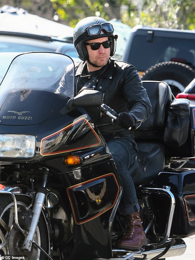 The Golden Globe and Emmy Award winner will leave the life of Los Angeles behind for the green hills of Scotland, photographed on his motorcycle in Los Angeles on February 22, 2024.