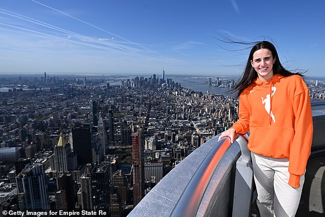 Earlier in the day, Clark was photographed atop the Empire State Building with other draft hopefuls.