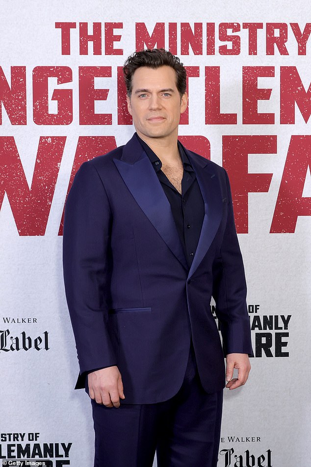 Cavill looked elegant in a navy blue suit at the premiere of his latest film