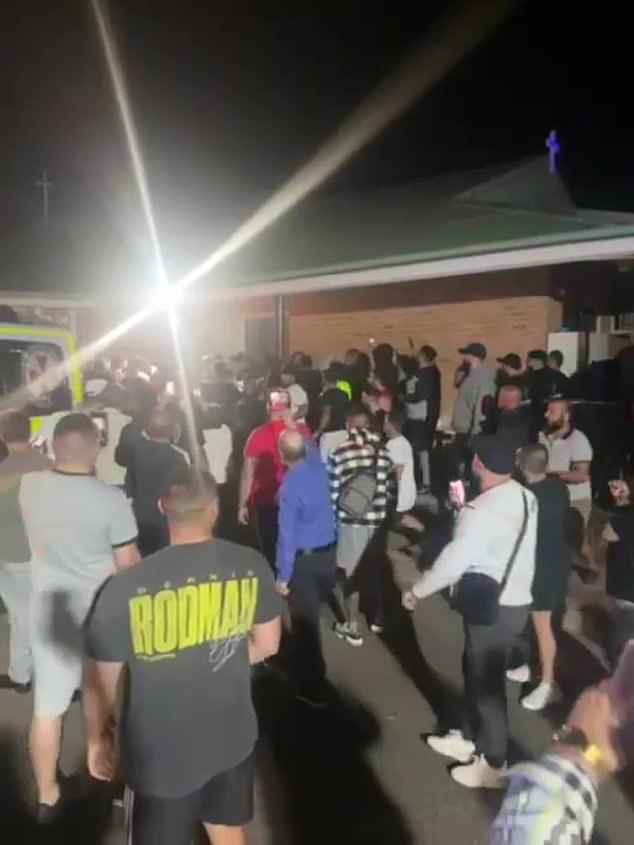 Up to 2,000 angry locals gathered outside the Good Shepherd Church of Christ in Wakeley, south-west Sydney, after Bishop Mar Mari Emmanuel was allegedly attacked.