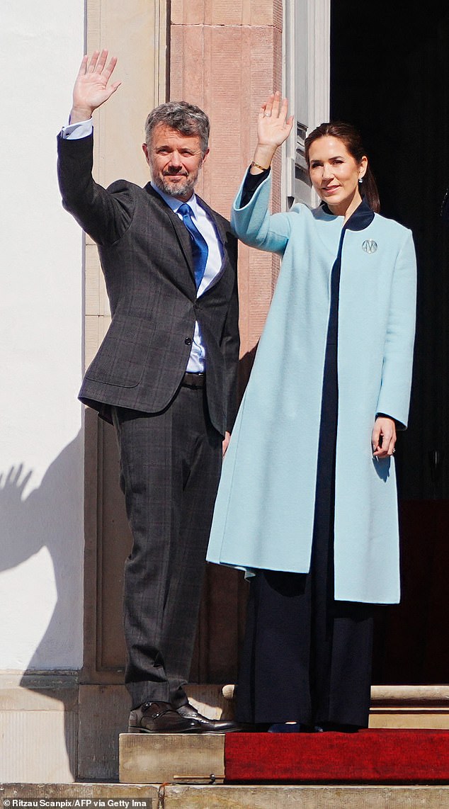 The couple, photographed outside the royal residence for Margrethe's birthday, chose to show sartorial solidarity by wearing blue, amid rumors of marital strife in recent months.
