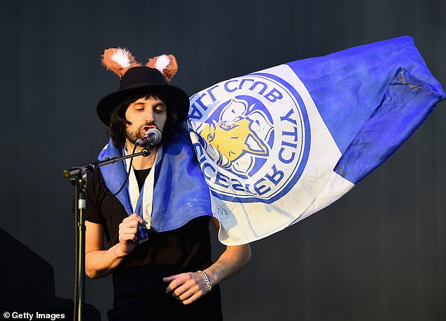 Pizzorno carries a Leicester flag on his shoulders while performing during the club's 2016 Premier League title parade.