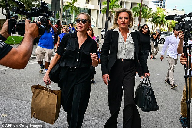 Karla Wittkop, Rocha's wife (left) and attorney Jacqueline Arango (right), leave the James L. King Federal Courthouse in Miami, Florida, on December 4, 2023.
