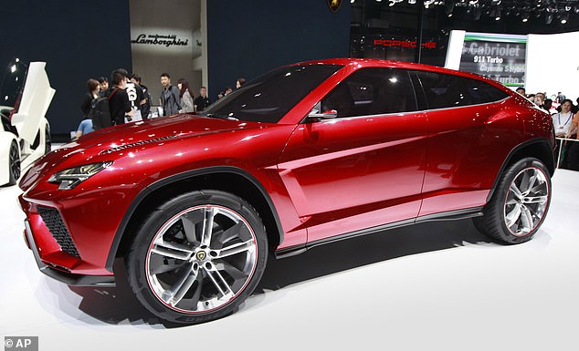 He had used the boat ramp to access the beach, where he drove back and forth for a few minutes before attempting to maneuver his £200k Lamborghini Urus back down the ramp after noticing panicked beachgoers, a witness said. to local media (file image of a Lamborghini Urus)